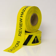 BARRICADE TAPE CAUTION REVIEW HAZARD BLACK ON YELLOW