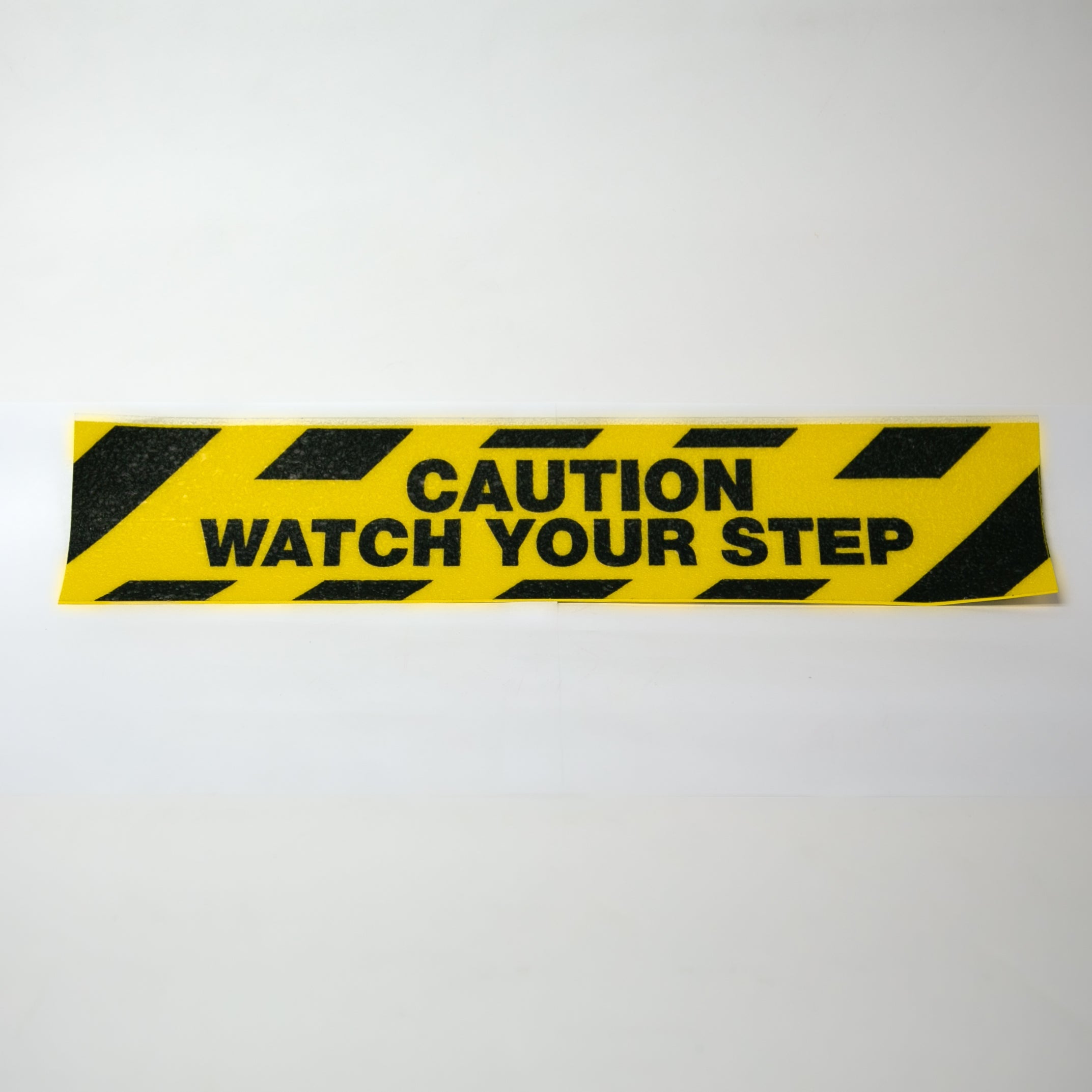 ANTI - SLIP VINYL LABELS - Caution Watch Your Step - NADCO Tapes & Labels, Inc.