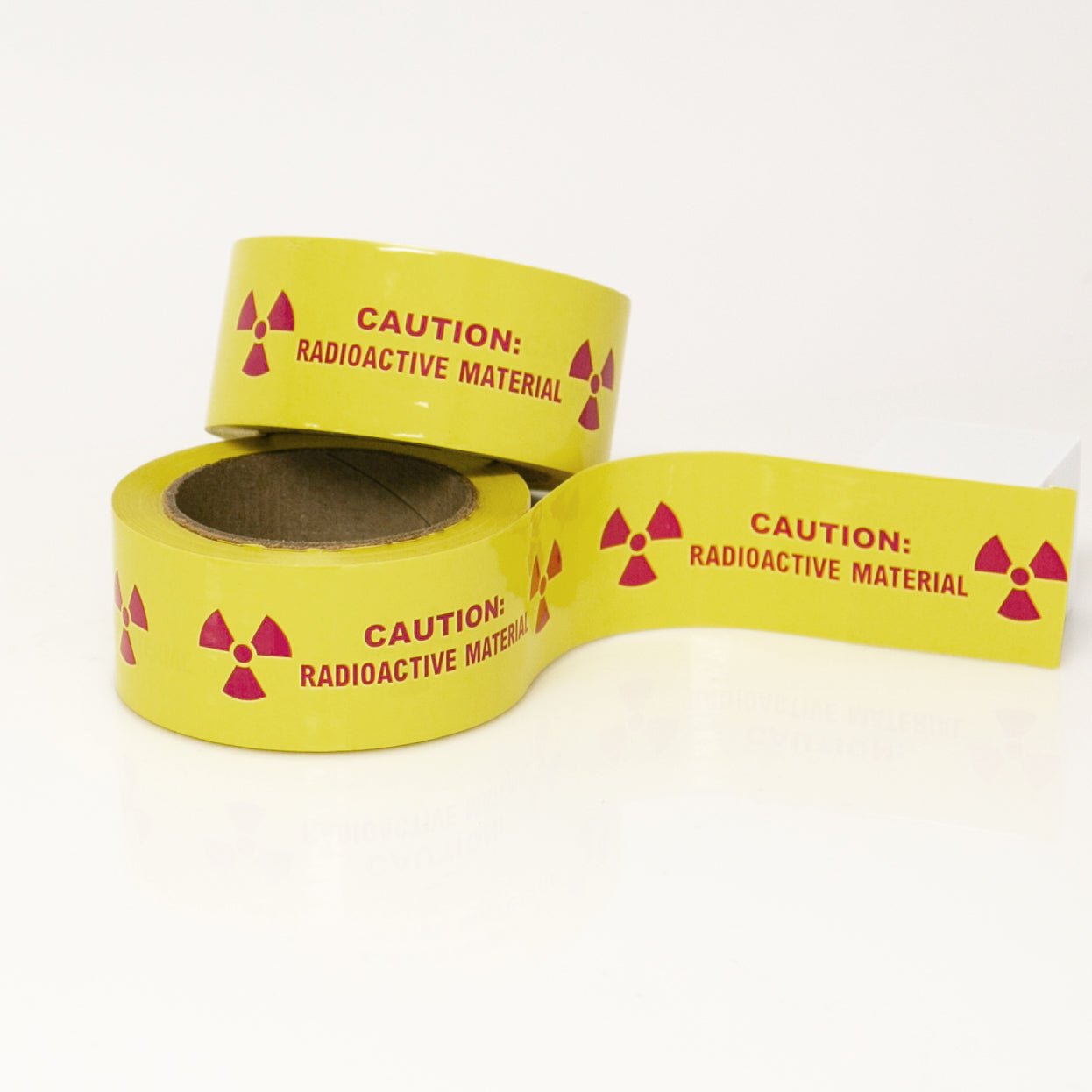 Caution Radioactive Material 2" x 6" Pieces on 36 yard Roll - NADCO Tapes & Labels, Inc.