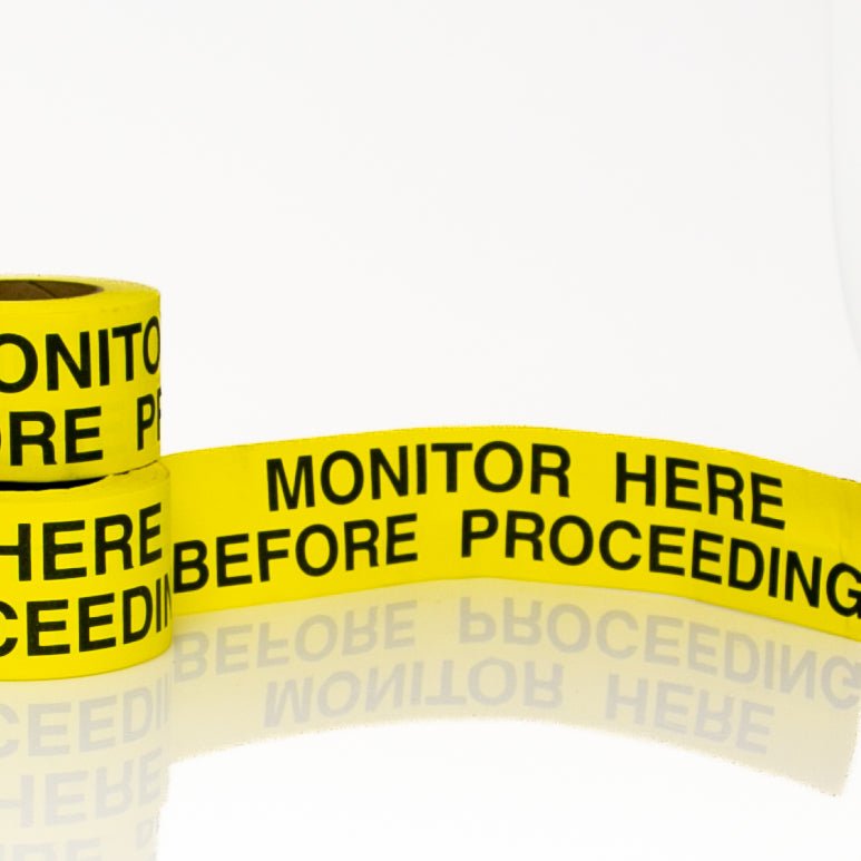 Monitor Here Before Proceeding 3" x 36 yards - NADCO Tapes & Labels, Inc.